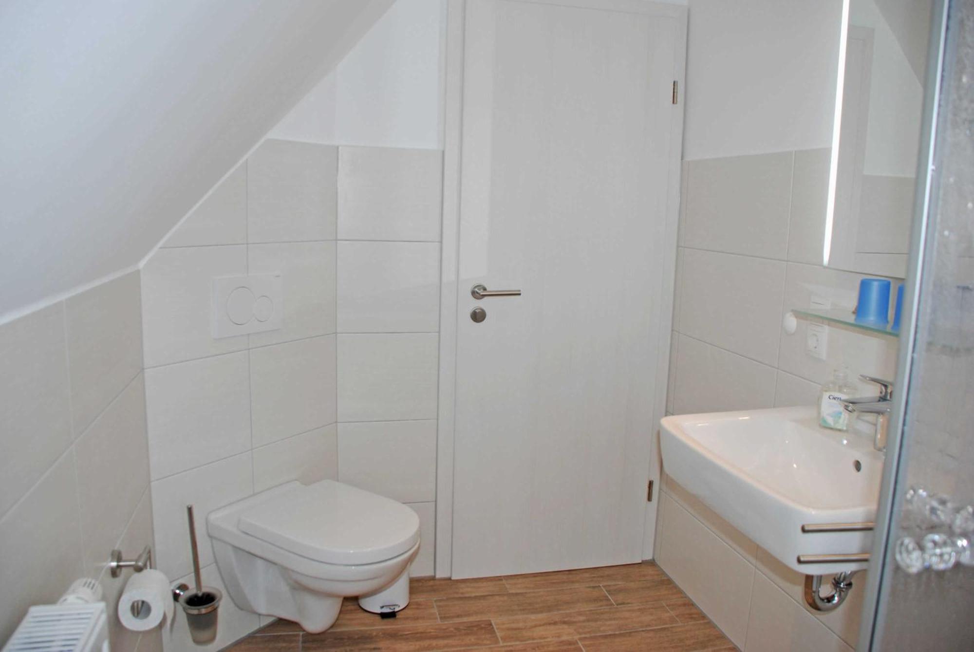 Ferienwohnungen Im Haus Am Deich Middelhagen Eksteriør billede